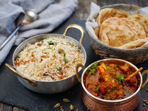 BHAGARA RICE , PAROTTA & GOAT GHEE ROAST
